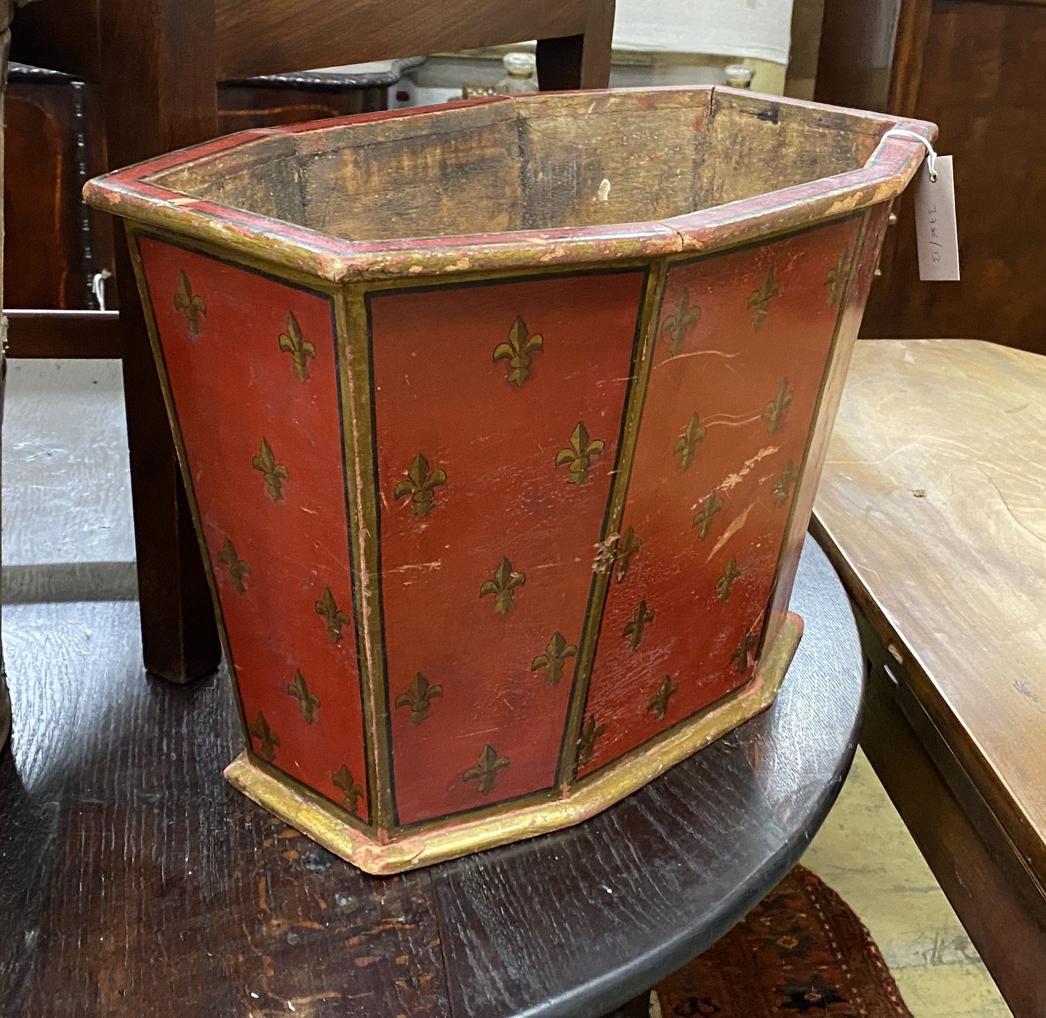 A painted wood octagonal waste paper bin, width 49cm, depth 29cm, height 35cm